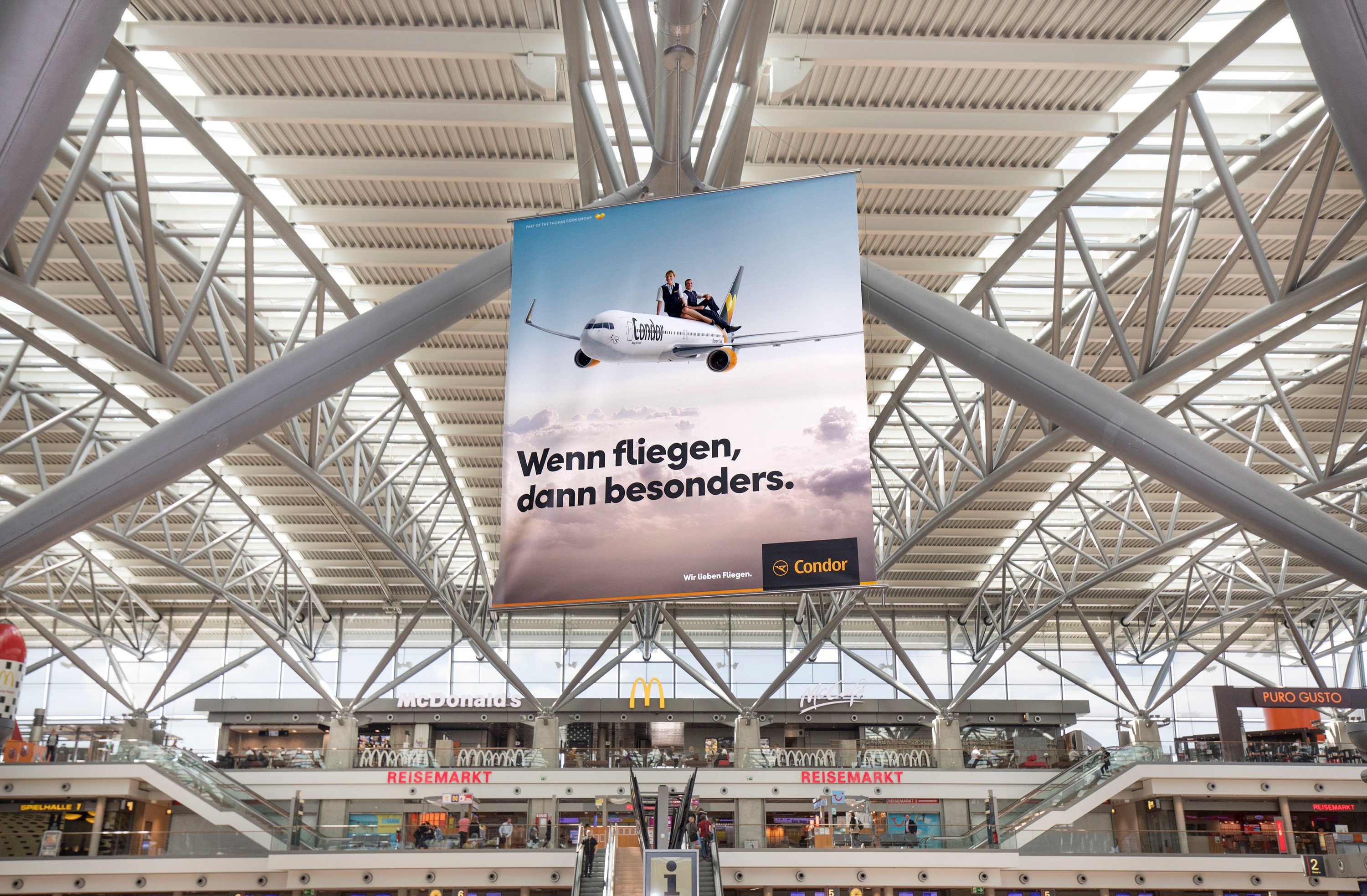 Excite Werbeagentur Condor Plakat am Flughafen