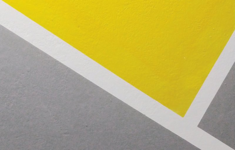 Geometrische Feldern in grau und gelb